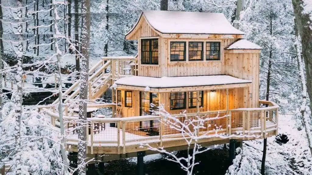 Snowy Treehouse Cabin Built from Beech Wood